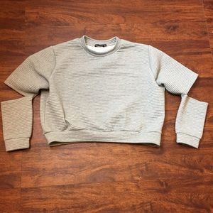 Jordyn Woods X Boohoo rib sweater cut out